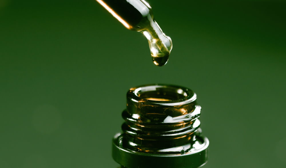 CBD oil being poured