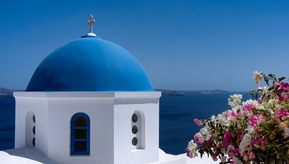 blue roof building in Santorini